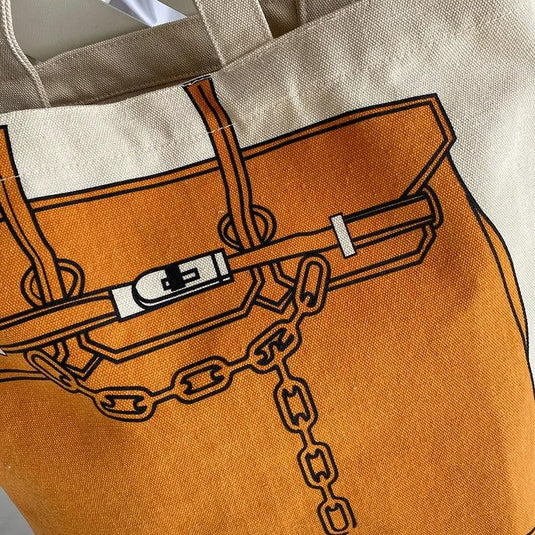 Evie Graphic Canvas Bag™